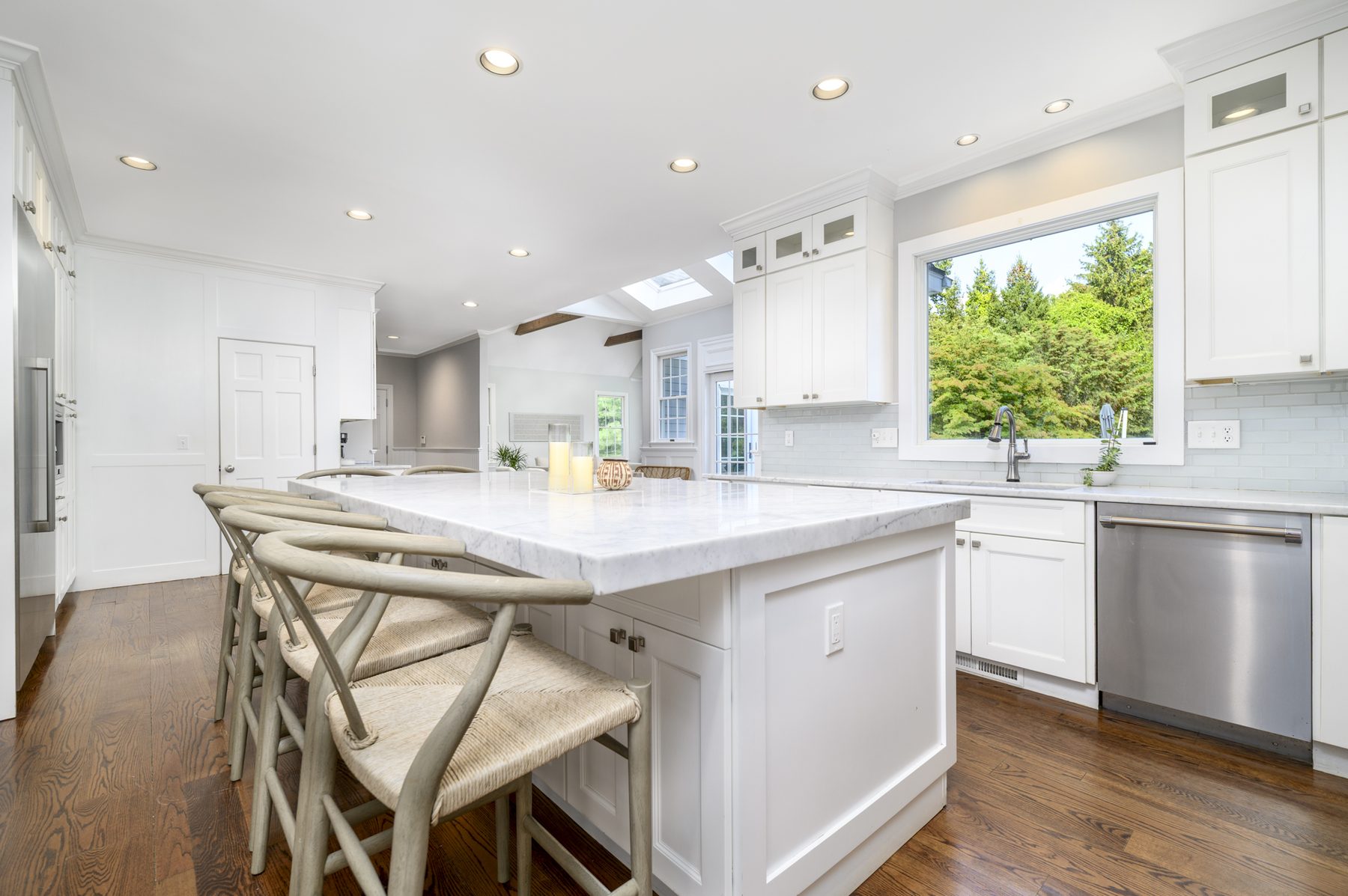 Marble-topped kitchen island with seating