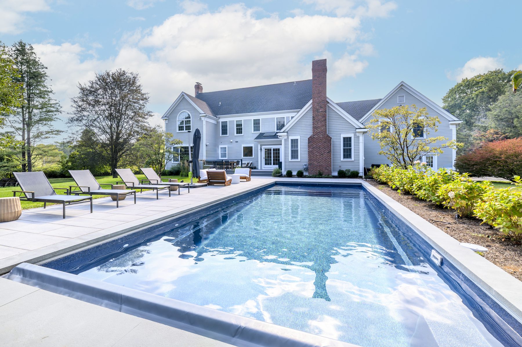 Heated pool overlooking the rear of the house